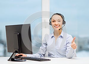 Female helpline operator showing thumbs up