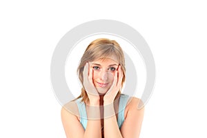 Female with her hands on her face