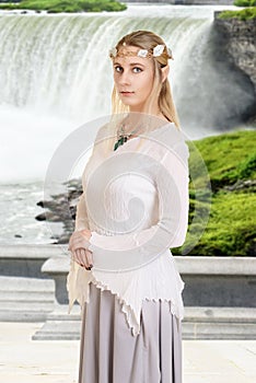 Female high elf with waterfall