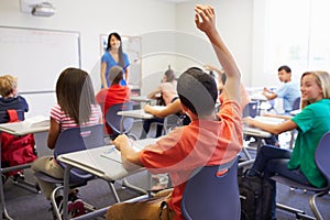 Female High School Teacher Taking Class