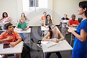 Female High School Teacher Taking Class photo
