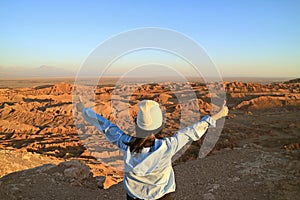 Female Hiker Excited with the Moon Valley or Valle de la Luna in Atacama Desert, Northern Chile