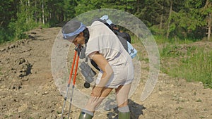 Female hiker with itchy skin on her legs