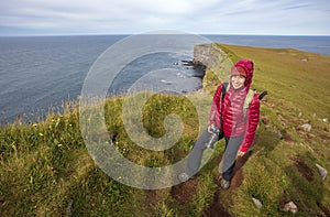 Female Hiker at LÃ¡trabjarg Cliffs in Iceland