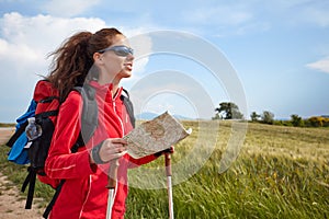 Female hiking woman happy and smiling during hike trek on Toscan