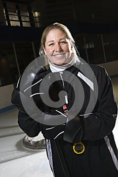 Female hockey coach.