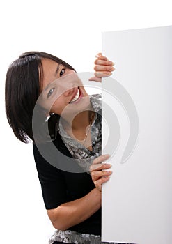 Female holding blank sign