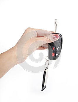 Female holding a car key