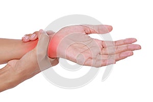 Female holding hand to spot of wrist pain