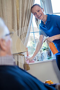 Female Home Help Cleaning House For Senior Man