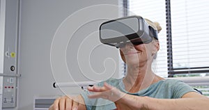 Female hospital patient using VR