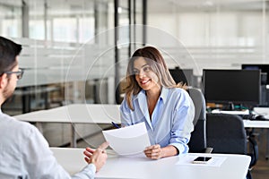 Female hr executive having job interview meeting with male recruit employee.