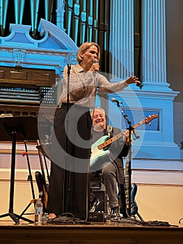 female jazz folk singer with guitarist, main stage Mechanics Hall worcester ma (Evening sky jazz band