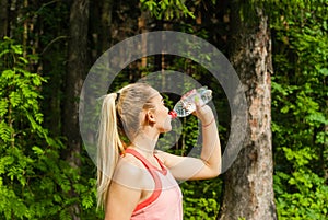 Female jogger quenches thirst