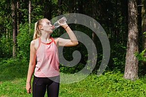 Female jogger quenches thirst