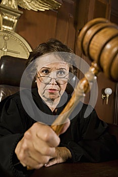 Female Judge Knocking Gavel