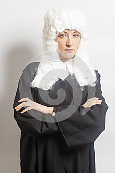 Female judge wearing a wig and Back mantle