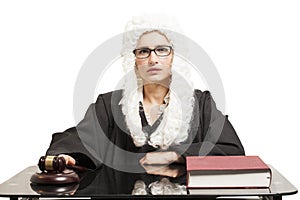 Female judge wearing a wig and Back mantle with eyeglasses with