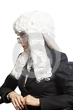 Female judge wearing a wig with eyeglasses