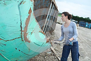 Female junk yard worker