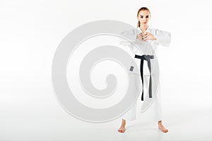 female karate fighter stretching fingers