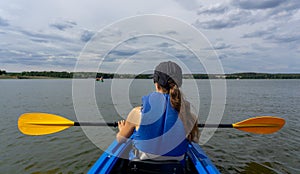 Female kayaker on Lake Woblitz enjoys a day on the water