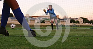 Female keeper waiting for female soccer player to kick the ball. 4k