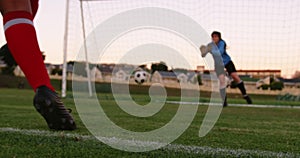 Female keeper waiting for female soccer player to kick the ball. 4k