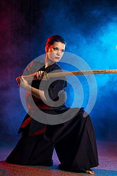 Female kendo fighter keen on traditional martial art