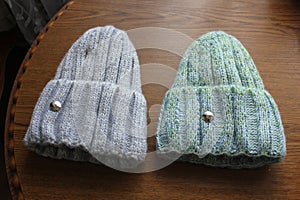 Female knitted hats of different colour