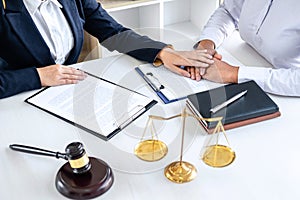 Female lawyer or Counselor working in courtroom have meeting with client are consultation with contract papers of real estate, Law