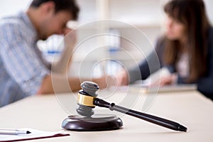 The female lawyer meeting with his male client in the office