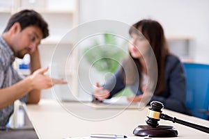 The female lawyer meeting with his male client in the office