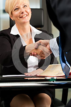 Female Lawyer or notary in her office