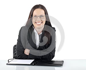 Female lawyer young professional sitting at office desk or table, front view