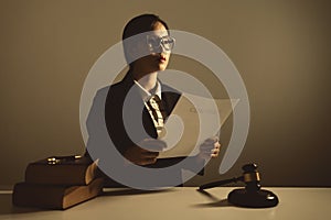 Female lawyers are sitting at the table, vintage.