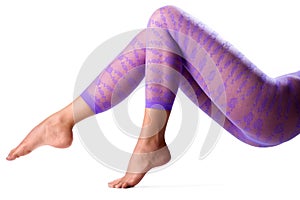 Female legs in purple leggings