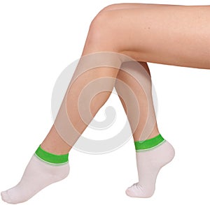 Female legs in socks. Isolated on white