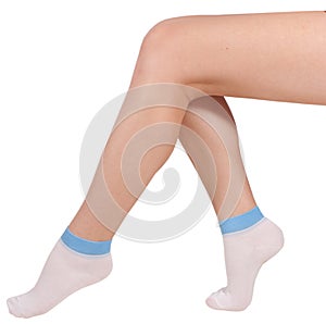 Female legs in socks. Isolated on white background