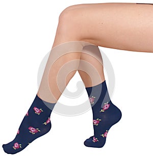 Female legs in socks. Isolated on white background