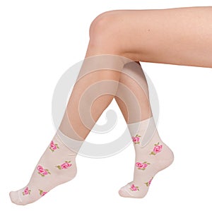 Female legs in socks. Isolated on white background