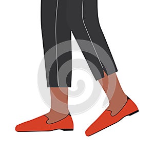Female legs wearing trendy shoes red colored