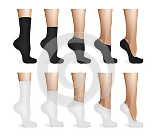 Female Legs In White And Black Socks