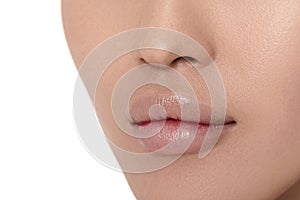 Female lips after augmentation procedure. clean skin.