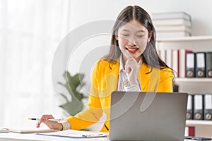 Female loan service providers asian people business professionals ensuring easy loan processes, working diligently, guiding