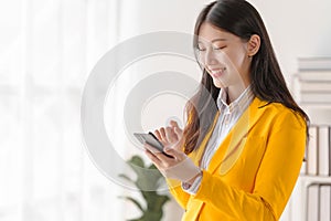 Female loan service providers asian people business professionals ensuring easy loan processes, working diligently, guiding