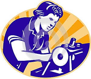 Female Machinist Seamstress Worker Sewing Machine photo