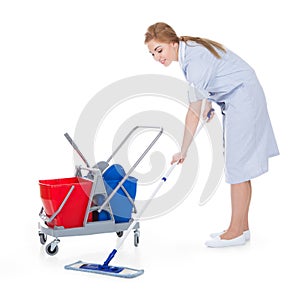 Female maid cleaning floor