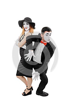 Female and male mimes posing