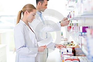 Female and male pharmacists